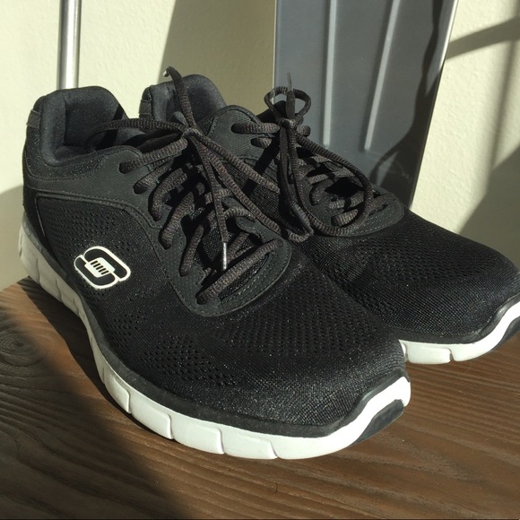 black skechers with white soles